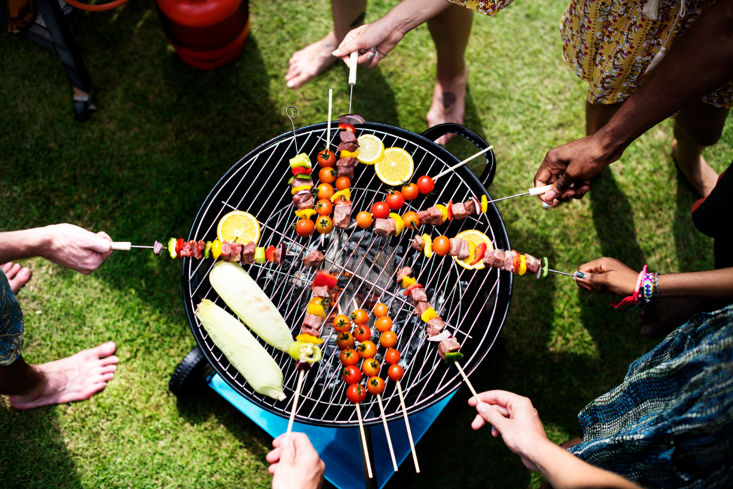 Grilling skewers at a backyard BBQ